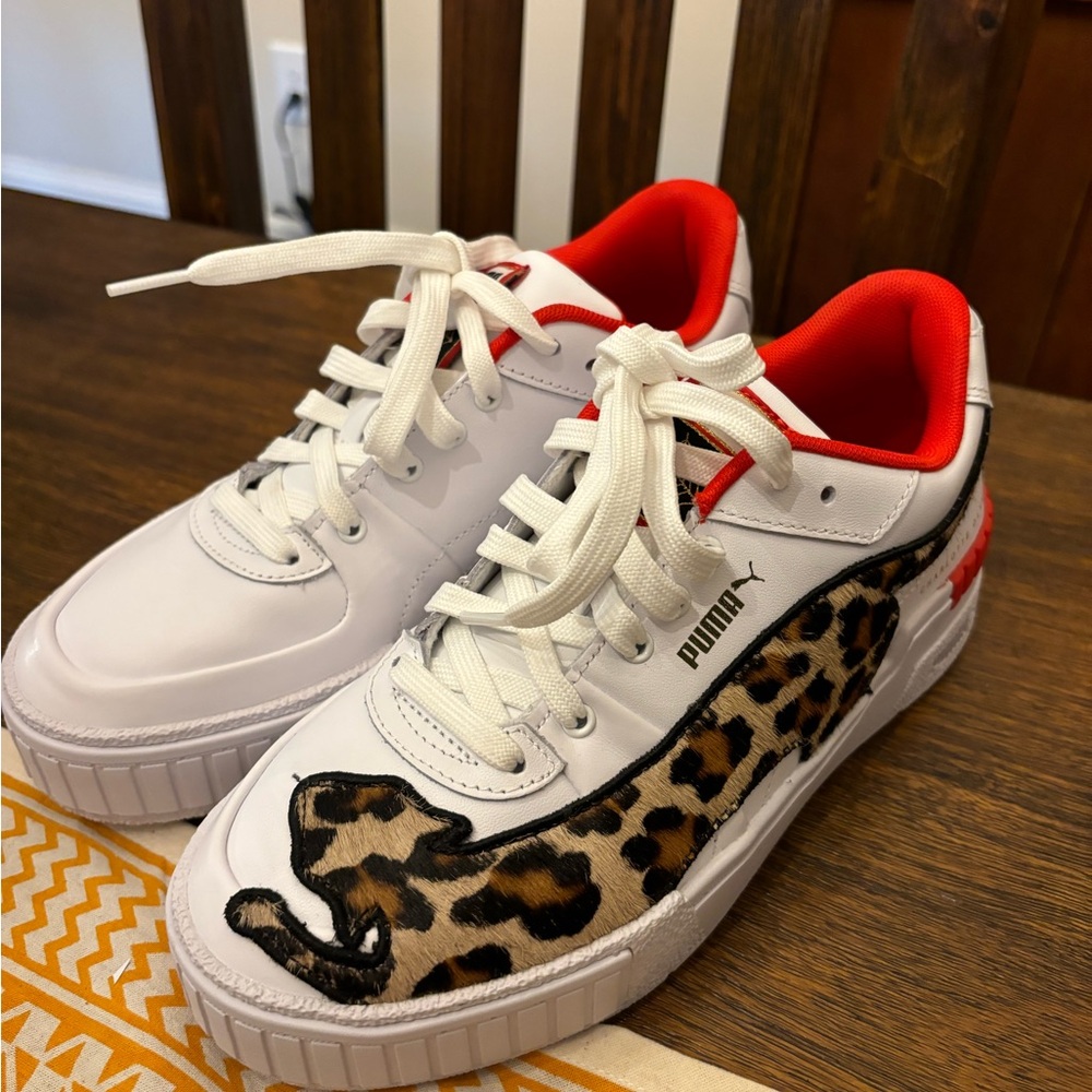 Brand new Charlotte Olympia + Puma shoes. Size women’s 8.